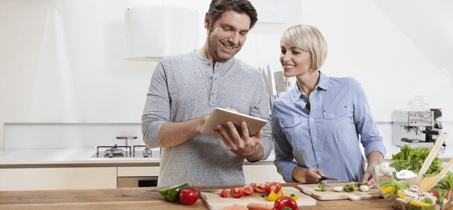 A couple cooking together